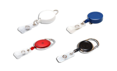 Reels for badge holders